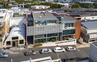 Architecturally inspired office with sunny balcony