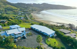 Lucrative Motel with beach life - room to grow