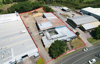 Expansive Yard And Functional Building
