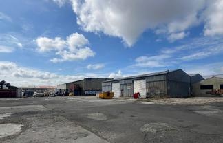 CBRE | Road Front Yard with Warehouse