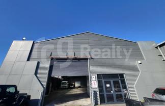 HIGH-PROFILE INDUSTRIAL WAREHOUSE & YARD