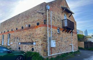 STANDALONE CHARACTER WITH NINE CAR PARKS
