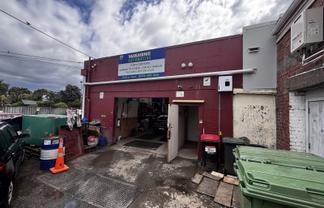 Bright ground floor storage or workshop with mezz