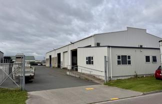 Freestanding warehouse with office and secure yard