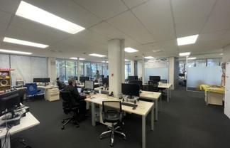 Well-located office with fitout & parking