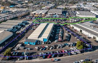 DRIVE-AROUND FACILITY WITH SIGNIFICANT YARD