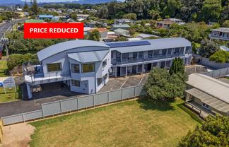 PRICE REDUCED - MODERN 9 UNIT BEACH-STRIP MOTEL
