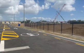 HIGH-EXPOSURE YARD NEAR PARK AND RIDE
