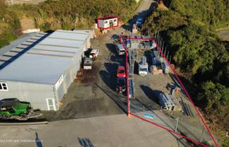 Compact, secure yard with connected portacom