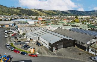 Vacant workshop with yard and parking