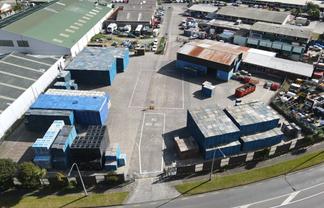 Concrete yard with supporting warehouse
