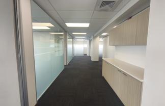 Corner-site top floor central Takapuna office