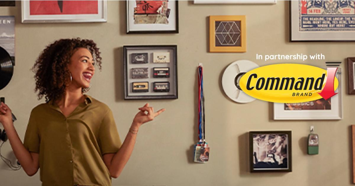 Gallery wall feature for interior design using command strips