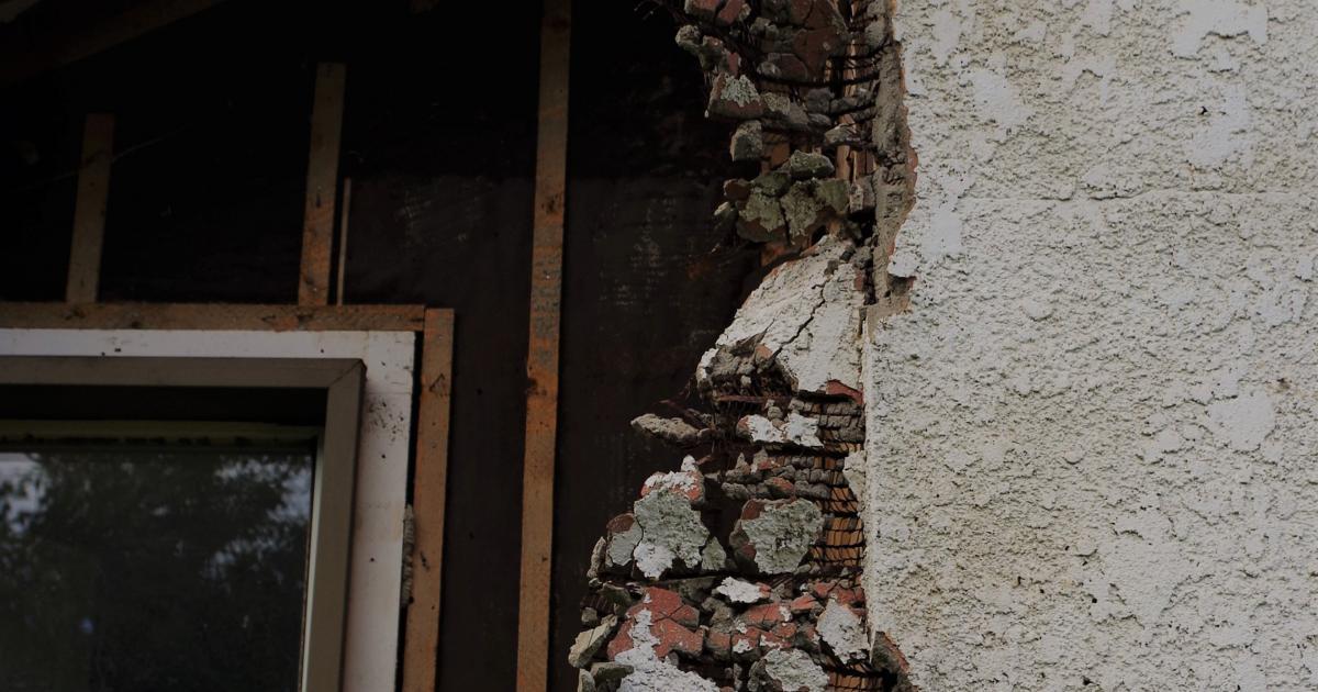 Asbestos wall in an investment property building